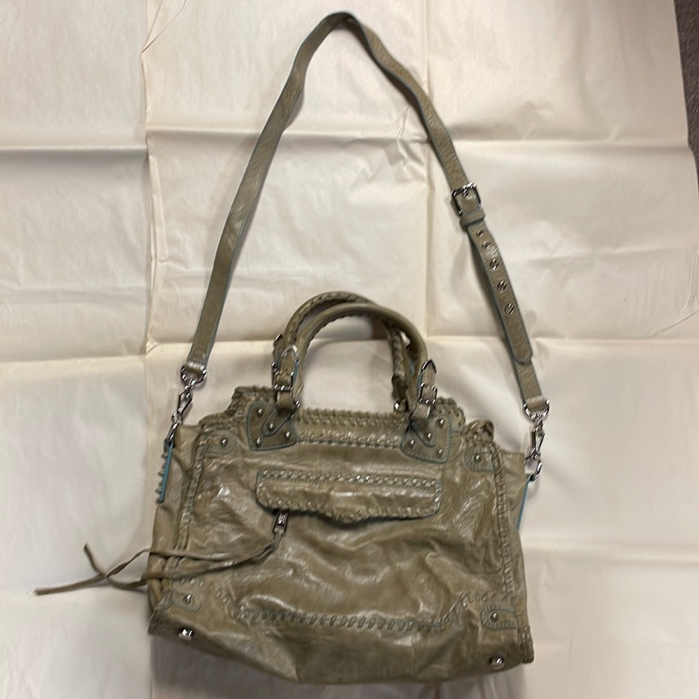 Light distressed khaki w/ light blue seams & silver hardware & spike details.